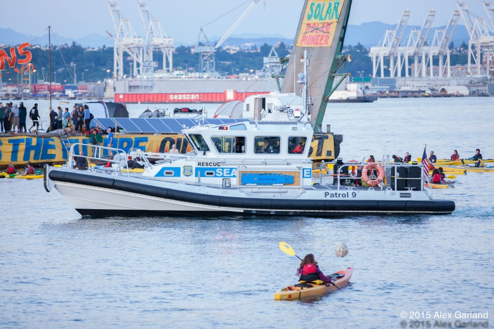 Kayaktivists form luminary flotilla in protest of Shell's Arctic drilling rig (6/6)
